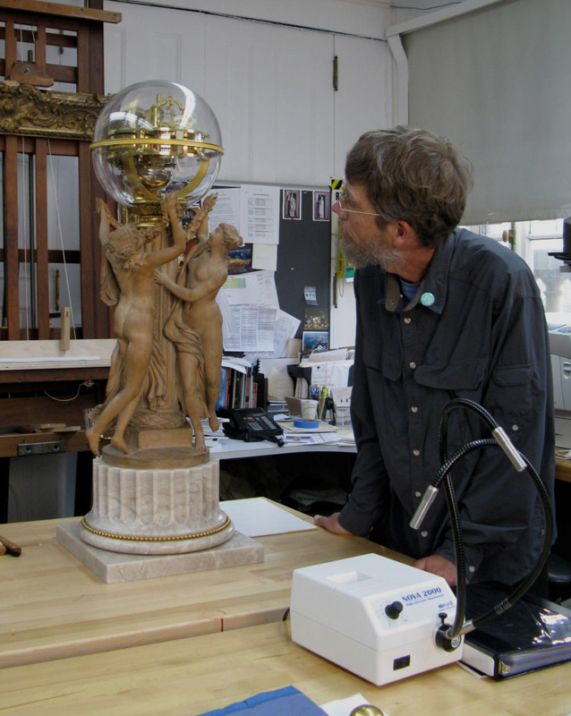 Max in the lab at the Frick Collection in NYC checking out a Clodian/LaPaute clock on the socle (base) he made for it. (2007)