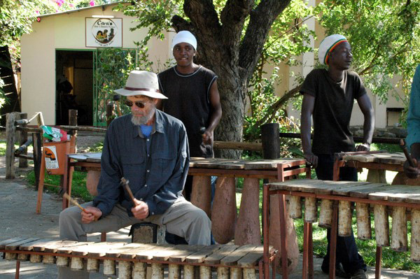 Max playing marimba with some buskers in Zimbabwe (2007)