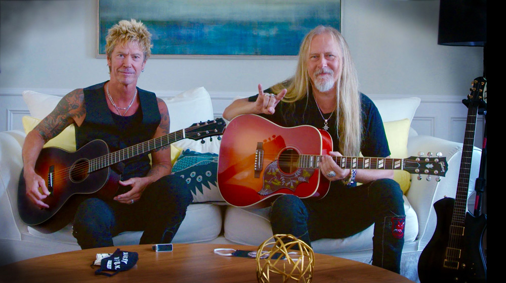 Duff McKagan (left) with President Carter guitar.