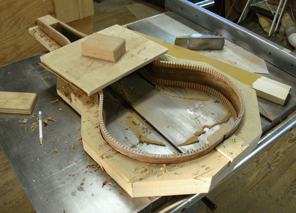 Photo 6. A large sanding board and a block plane were used to dress the linings to the ribs.