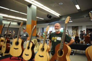 Jay De Rocher with his Mazama Guitars. (Newsom)