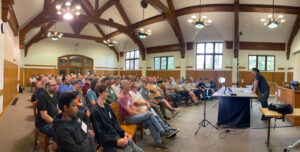 Big crowd at Alex Glasser's talk on the history of the American steel string guitar. (McElrath)