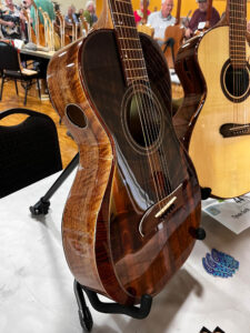 Nice close-up of Tyson Soth's guitars on display. (Woo)