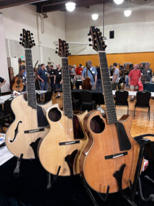 A trio of Mike Doolin's archtop guitars. (Woo)