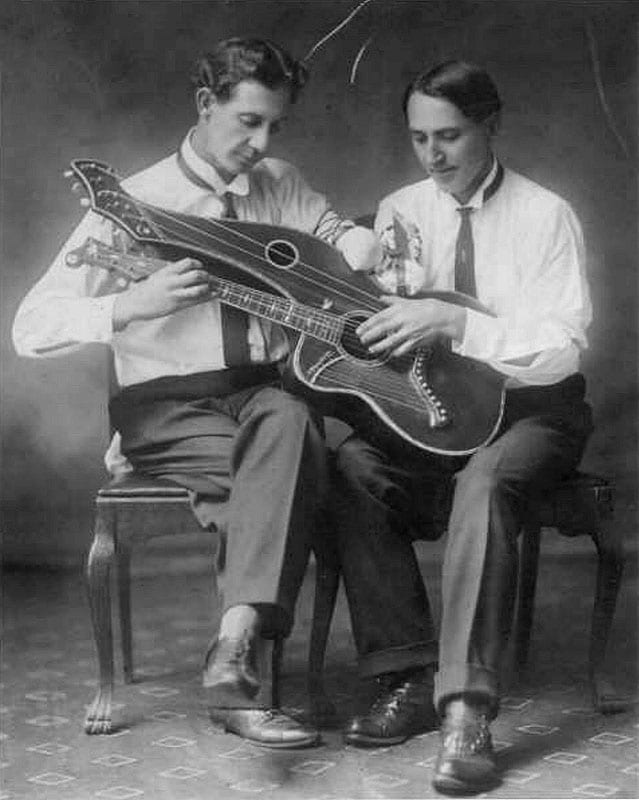 Three photos of one-handed players of string instruments. They didn't have SawStop. (image 1 of 3)
