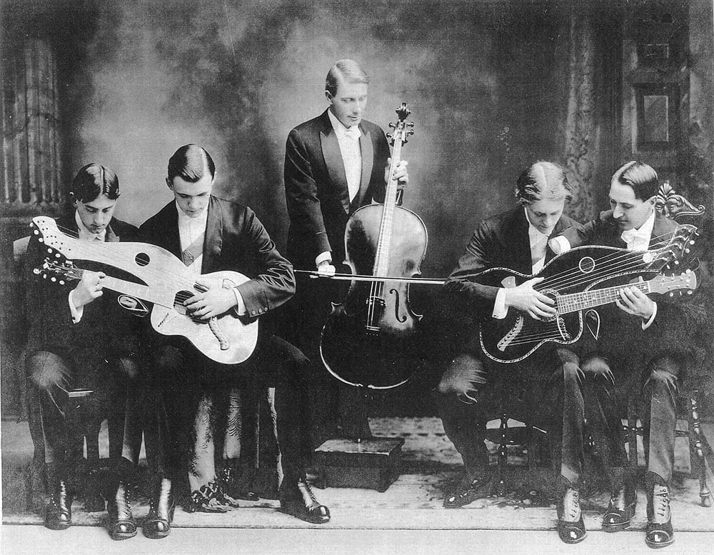 Three photos of one-handed players of string instruments. They didn't have SawStop. (image 3 of 3)