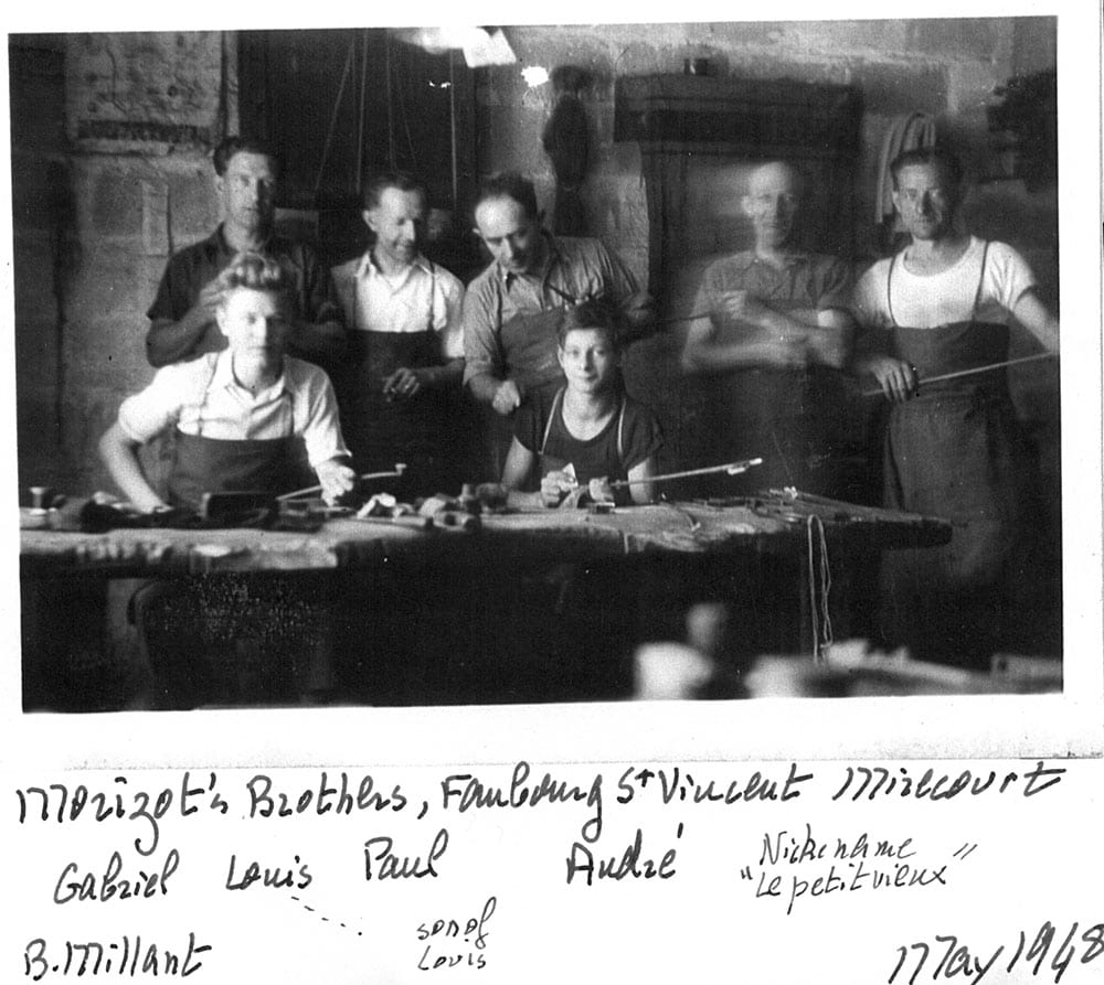 The Morizot brothers' workshop in Mirecourt in May of 1948. Back row, from the left: Brothers Marcel, Louis, Paul, André, and George Morizot. Front row, left, is a young Bernard Millant. The other young man is Louis Morizot's son.