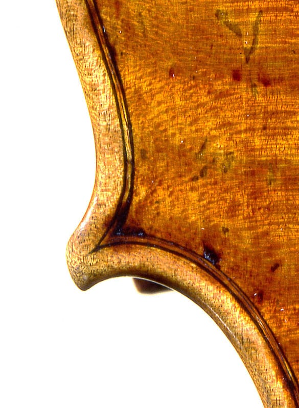 A violin corner by Del Gesu.