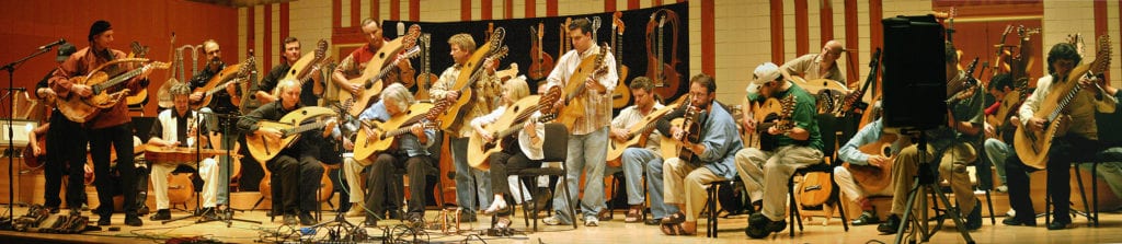 Twenty-seven players rehearse for the grand finale of Harp Guitar Gathering 3.