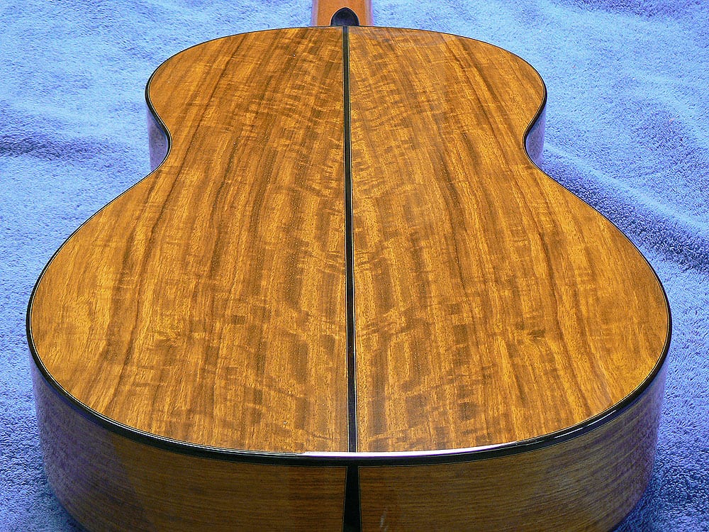 Guild member Ron Bushman made this guitar with a back of kiaat wood and a peghead overlay of tambotie wood. (image 2 of 2)