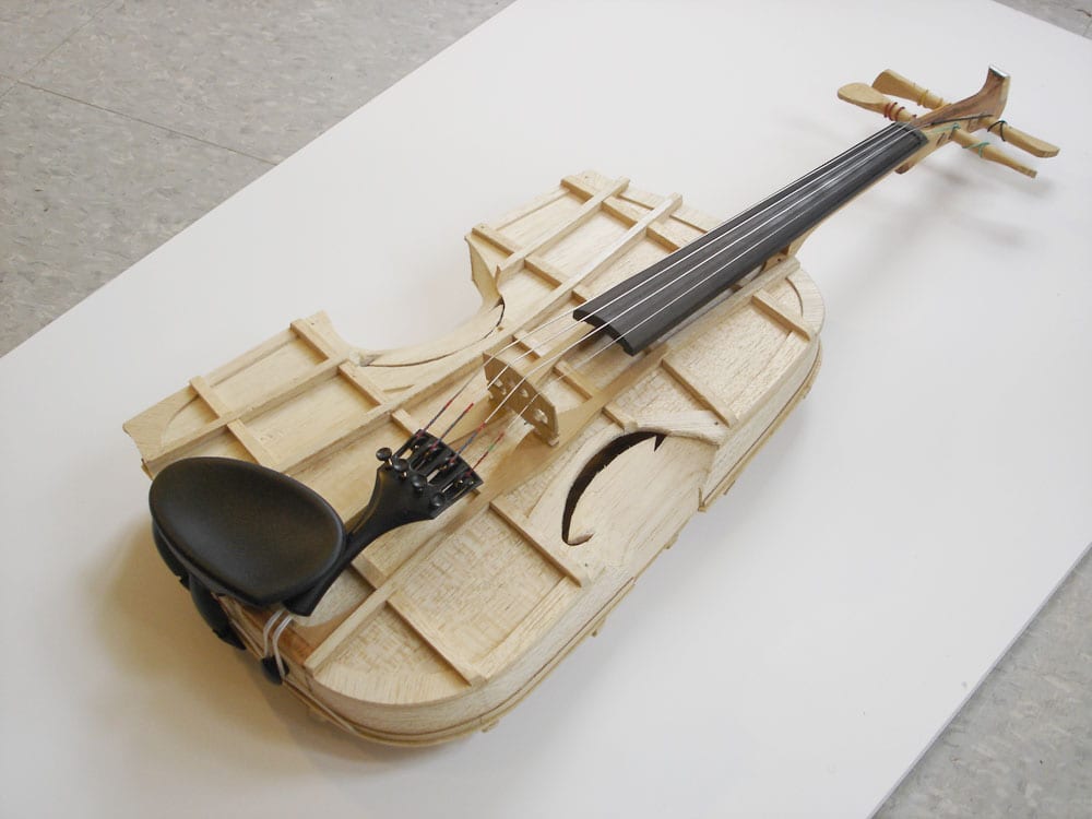 A half-size violin in balsa.