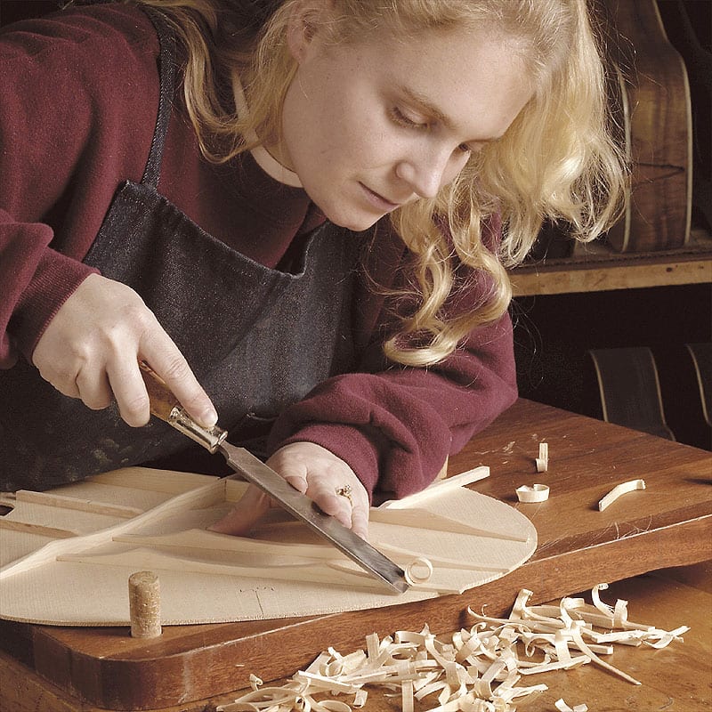 That's Terri Antonis carving the braces.