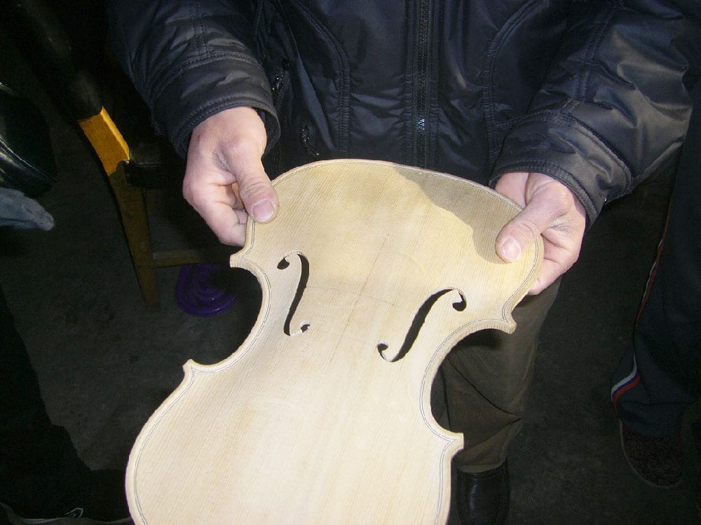Bill Garafalo visits a violin factory in China. (image 7 of 8)