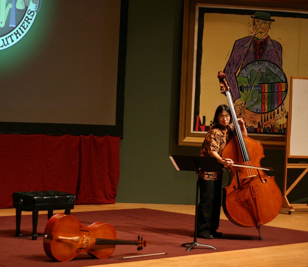 Miriam Chong demonstrates the bass.