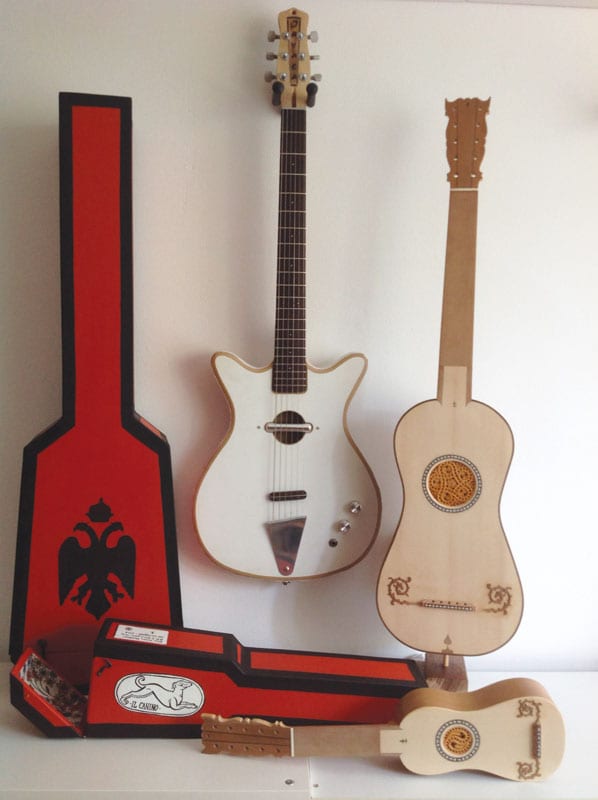 Author Jan van Cappelle also makes masonite guitars after the style of Danelectro.