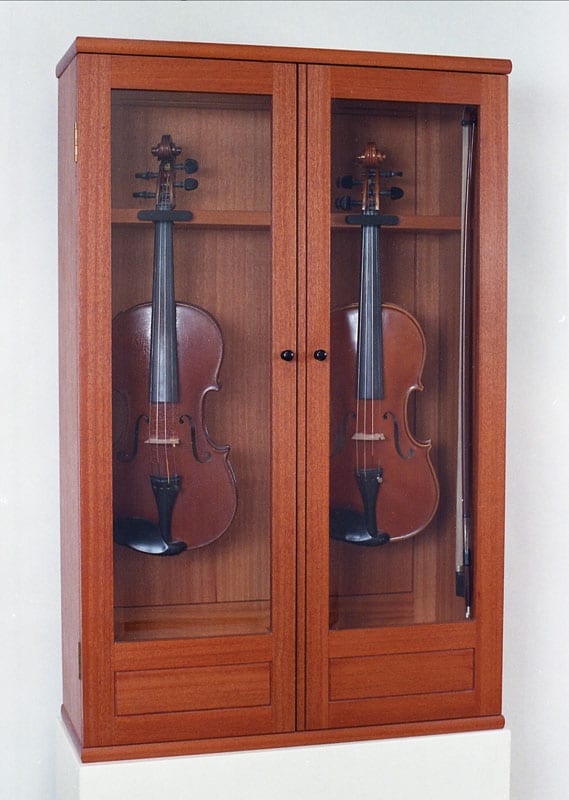 Ken made the fiddles and the cabinet (Image 1 of 2).
