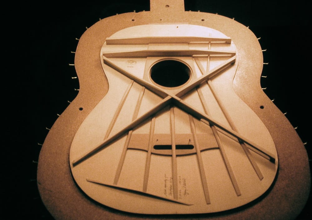 A later steel string guitar bracing pattern (Image 1 of 3).