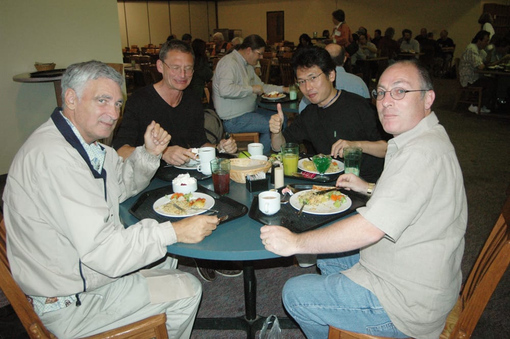 Jim Forderer (left) and James Westbrook dine in the cafeteria at the 2004 GAL Convention.