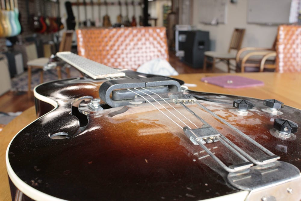 Peek inside the horseshoes to see the coil in this vintage 1937 Epiphone Electar.